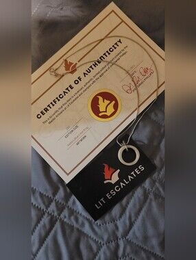 Lit Escalates Addie LaRue Wooden Ring Necklace
